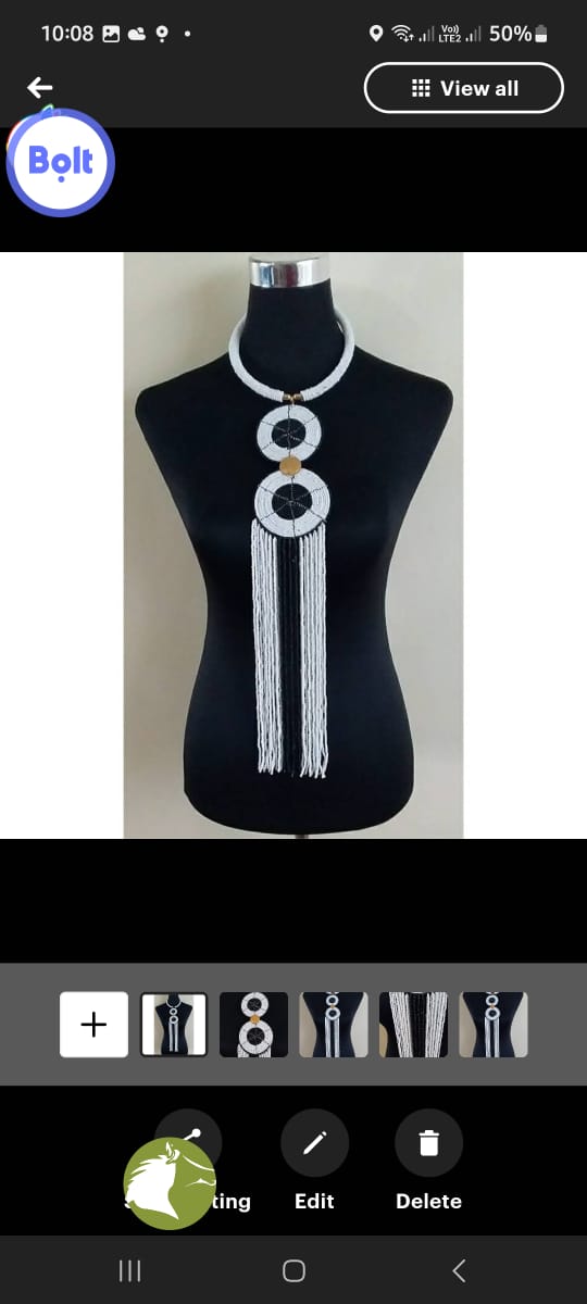 Leather clutch bag with matching necklace and bracelets